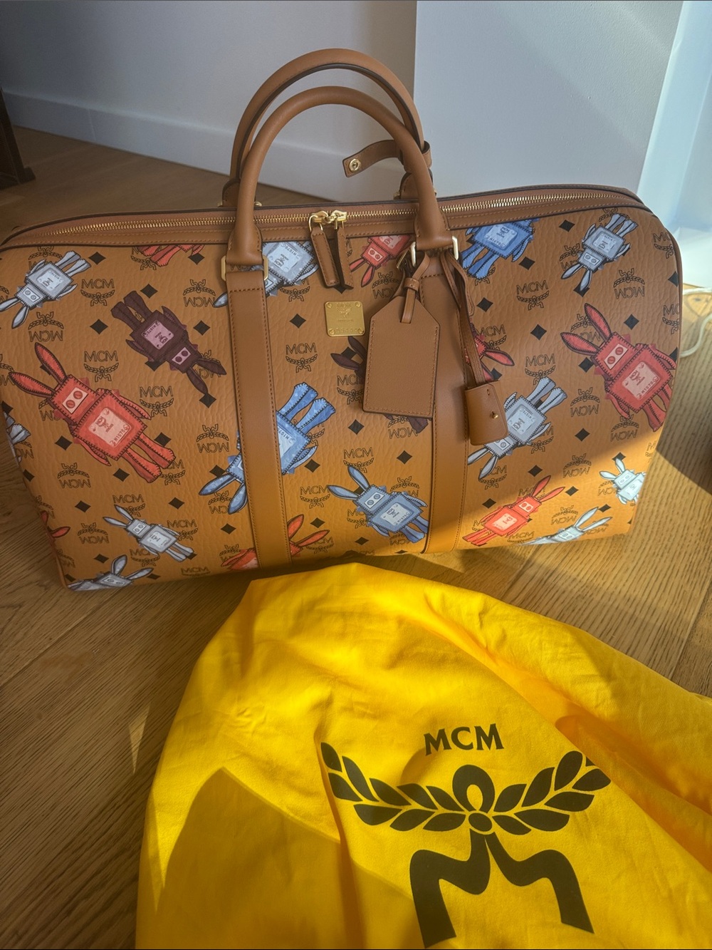 Brand New MCM Cognac Visetos Weekender with Multicolor Perfume Bottle Print. - Picture 2 of 7